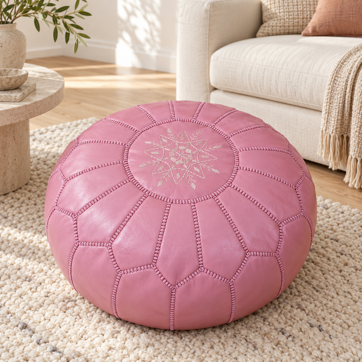 Blush pink Moroccan leather pouf in an Australian living room