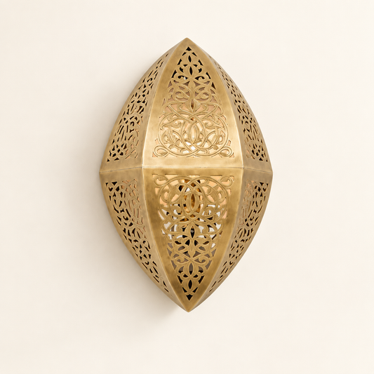 Marrakech Petal handcrafted brass wall sconce on a neutral studio background