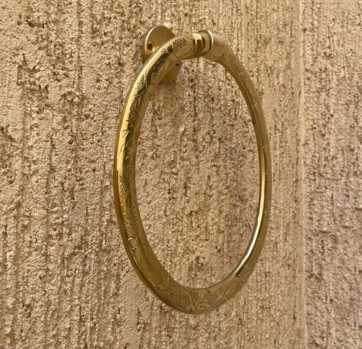 Side view of Moroccan brass towel ring