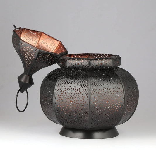 Black Moroccan lantern with copper interior and open lid