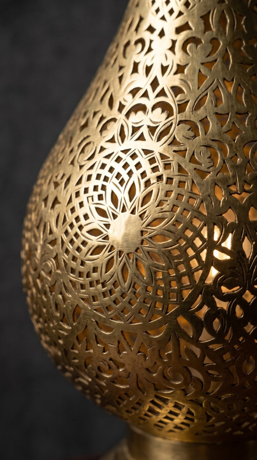 Detailed Moroccan pierced metalwork on teardrop lamp