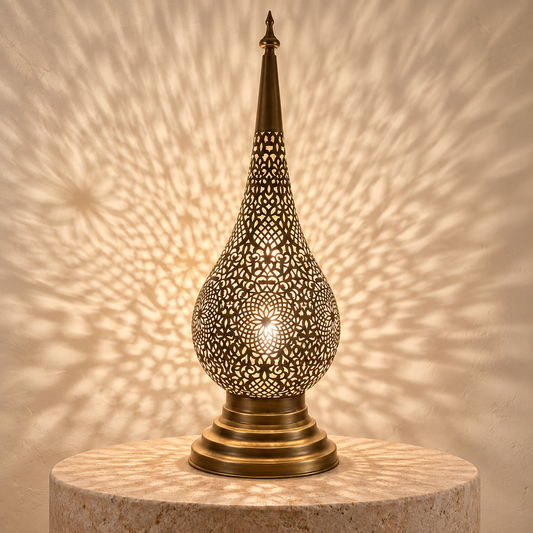 Handcrafted Moroccan pierced brass teardrop table lamp illuminated