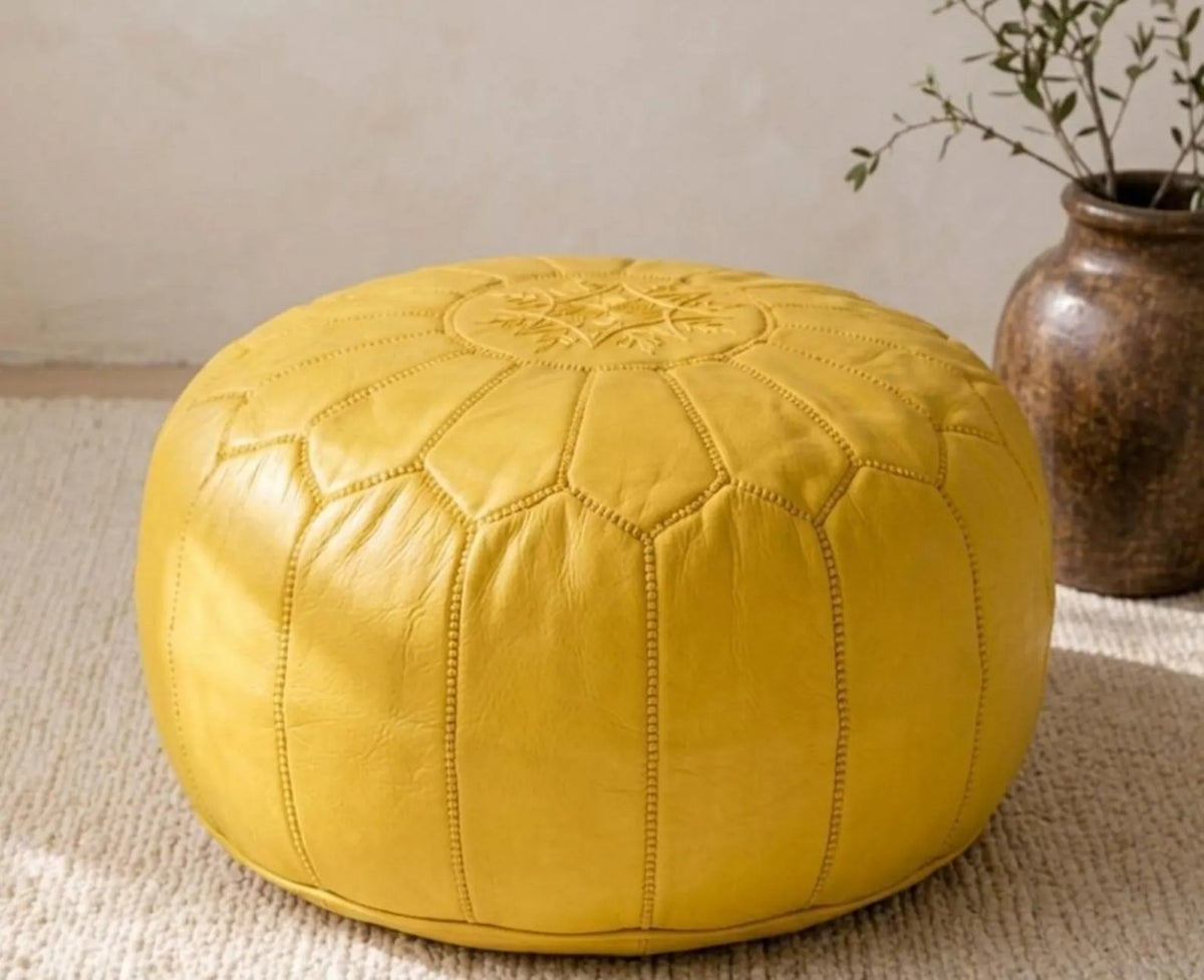 Handcrafted mustard yellow Moroccan leather pouf