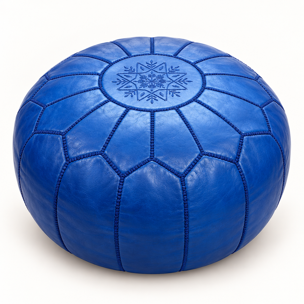 Royal blue Moroccan leather pouf on a white background