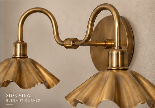 Side view showing the curved brass arms and sculptural petal shades