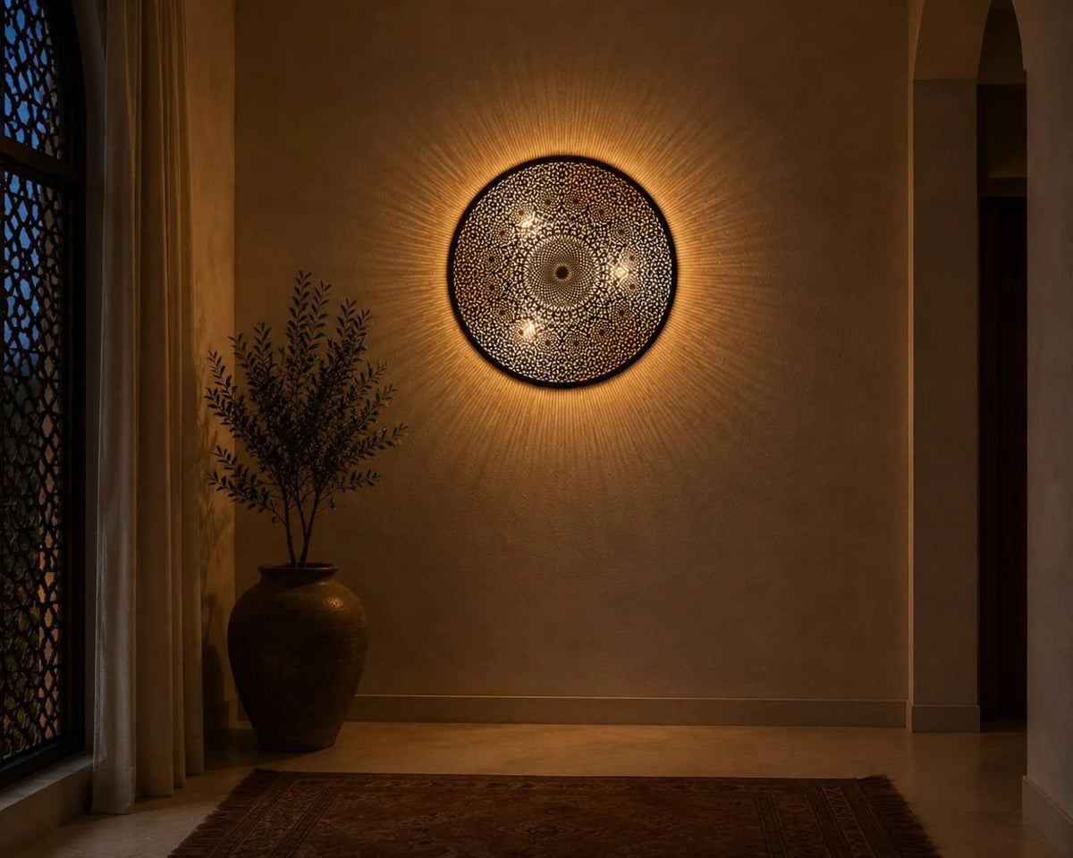Moroccan round wall lamp casting warm patterned light