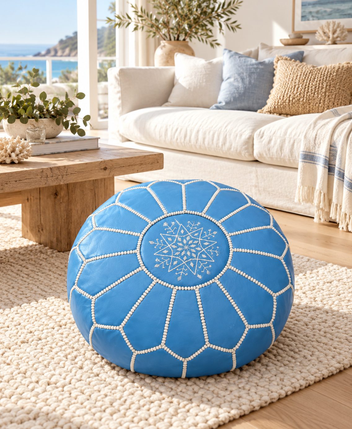 Sky blue Moroccan leather pouf in an Australian coastal living room