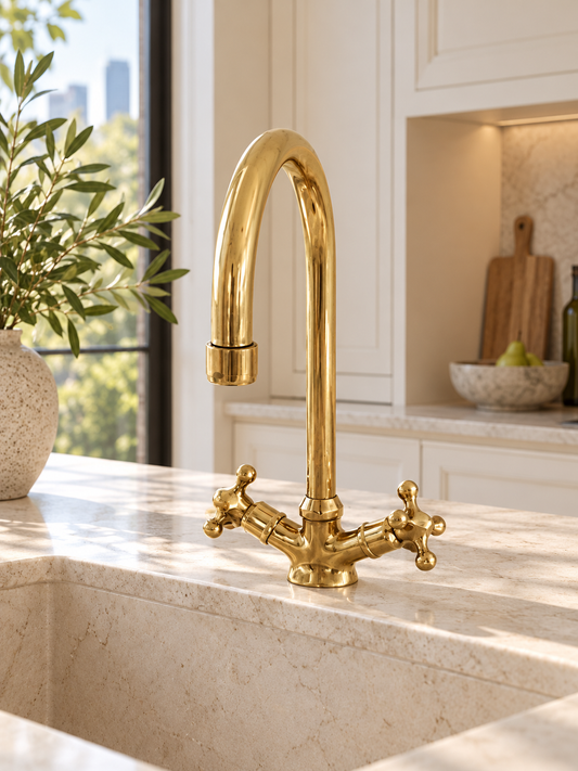 Unlacquered brass gooseneck faucet in a luxury Australian kitchen