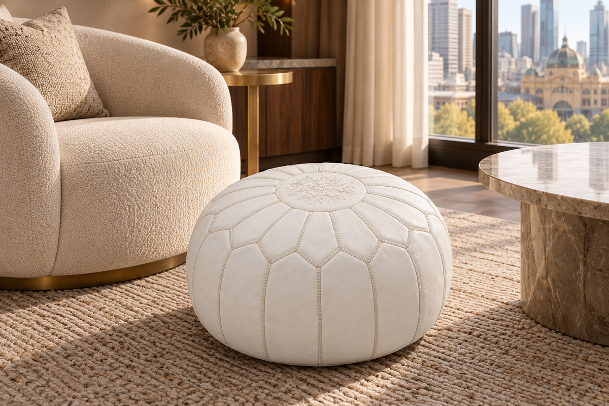 White Moroccan leather pouf in an elegant Melbourne luxury hotel lounge